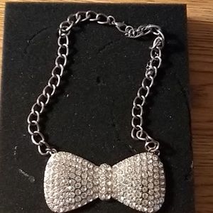 Silver bow tie necklace costume jewelry